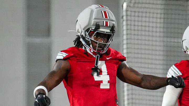 Ohio State Buckeyes wide receivers Jeremiah Smith (4) and Brandon Inniss (1) await a punt during football training camp inside the Woody Hayes Athletic Center in Columbus on Aug. 7, 2026.