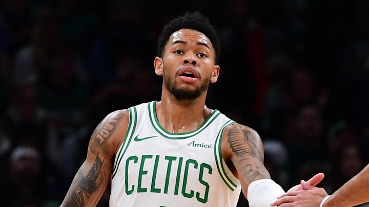Nov 23, 2025; Boston, Massachusetts, USA; Boston Celtics guard Anfernee Simons (4) is congratulated by guard Derrick White (9) after a basket during the first half at TD Garden. Mandatory Credit: Bob DeChiara-Imagn Images Nov 23, 2025; Boston, Massachusetts, USA; Boston Celtics guard Anfernee Simons (4) is congratulated by guard Derrick White (9) after a basket during the first half at TD Garden. Mandatory Credit: Bob DeChiara-Imagn Images