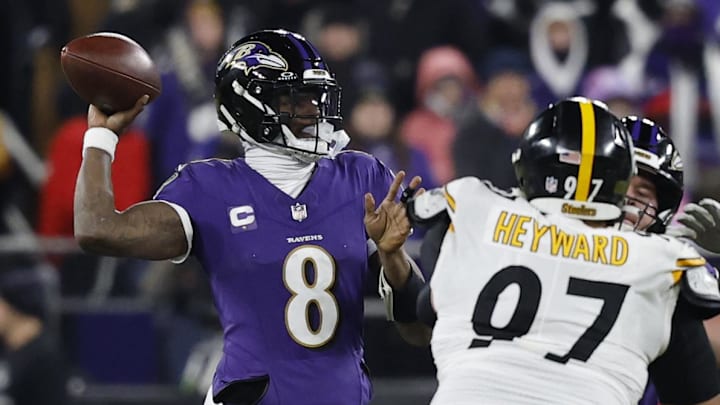 Jan 11, 2025; Baltimore, Maryland, USA; Baltimore Ravens quarterback Lamar Jackson (8) passes the ball as Pittsburgh Steelers defensive tackle Cameron Heyward (97) defends in an AFC wild card game at M&T Bank Stadium. Jan 11, 2025; Baltimore, Maryland, USA; Baltimore Ravens quarterback Lamar Jackson (8) passes the ball as Pittsburgh Steelers defensive tackle Cameron Heyward (97) defends in an AFC wild card game at M&T Bank Stadium.
