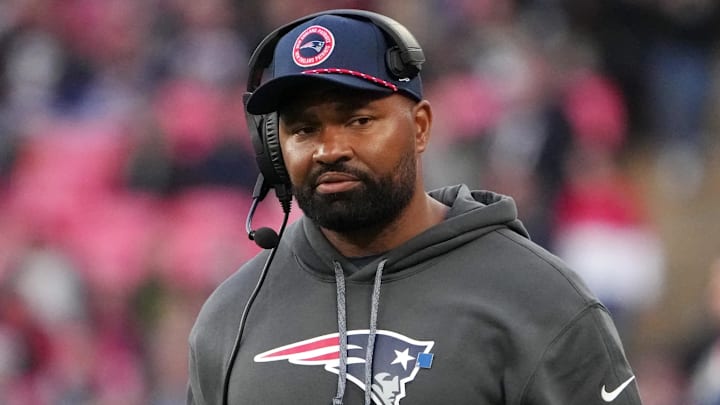 Oct 20, 2024; London, United Kingdom; New England Patriots coach Jerod Mayo watches from the sidelines against the New England Patriots in the second half of an NFL International Series game at Wembley Stadium. / Kirby Lee-Imagn Images