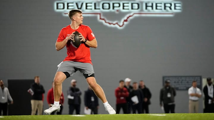 Ohio State Buckeyes quarterback Will Howard drops back to pass during the pro day for NFL scouts at the Woody Hayes Athletic Center on March 26, 2025. Ohio State Buckeyes quarterback Will Howard drops back to pass during the pro day for NFL scouts at the Woody Hayes Athletic Center on March 26, 2025.