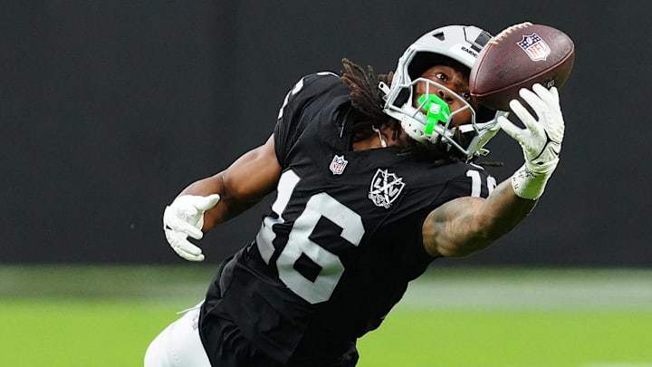 Sep 29, 2024; Paradise, Nevada, USA; Las Vegas Raiders wide receiver Jakobi Meyers (16) attempts to make a catch against the Cleveland Browns during the third quarter at Allegiant Stadium. Mandatory Credit: Stephen R. Sylvanie-Imagn Images