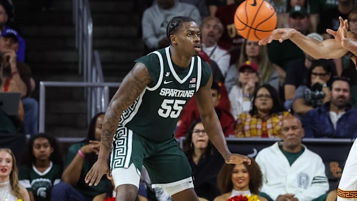 Feb 1, 2025; Los Angeles, California, USA;  USC Trojans forward Saint Thomas (0) passes the ball against the Michigan State Spartans at Galen Center. Mandatory Credit: William Navarro-Imagn Images