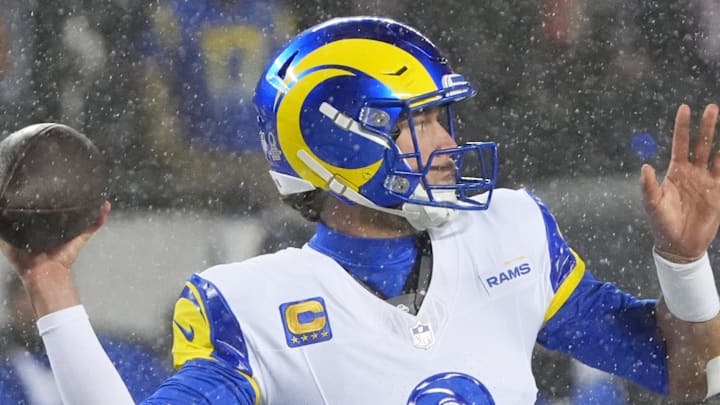 Jan 18, 2026; Chicago, IL, USA; Los Angeles Rams quarterback Matthew Stafford (9) throws a pass against the Chicago Bears during the second quarter of an NFC Divisional Round game at Soldier Field. Mandatory Credit: David Banks-Imagn Images