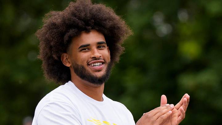 Oregon quarterback Dante Moore celebrates after a reception during a youth football camp at Marist Catholic High School on June 20, 2026, in Eugene, Oregon.