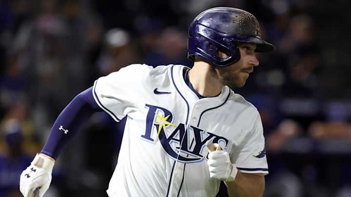 Sep 16, 2025; St. Petersburg, Florida, USA; Tampa Bay Rays second baseman Brandon Lowe (8) hits a RBI single ninth inning against the Toronto Blue Jays at George M. Steinbrenner Field. 