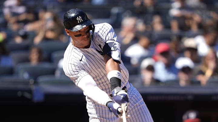 Aug 27, 2025; Bronx, New York, USA; New York Yankees designated hitter Aaron Judge (99) hits a single against the Washington Nationals during the third inning at Yankee Stadium. Mandatory Credit: Gregory Fisher-Imagn Images