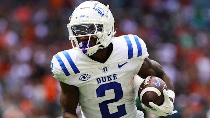Nov 2, 2024; Miami Gardens, Florida, USA; Duke Blue Devils wide receiver Sahmir Hagans (2) runs with the football for a touchdown against the Miami Hurricanes during the second quarter at Hard Rock Stadium. Mandatory Credit: Sam Navarro-Imagn Images