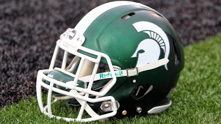Sep 4, 2015; Kalamazoo, MI, USA; General view of Michigan State Spartans helmet on field prior to a game against Western Michigan at Waldo Stadium.