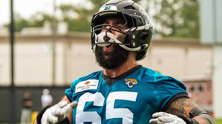 Jacksonville Jaguars guard Patrick Mekari (65) gets the fans excited during the second day of minicamp at the Miller Electric Center, Wednesday, June 10, 2026, in Jacksonville. 
