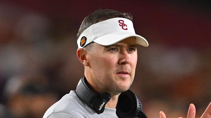 Oct 1, 2022; Los Angeles, California, USA; USC Trojans head coach Lincoln Riley applauds after a touchdown in the first half against the Arizona State Sun Devils at United Airlines Field at the Los Angeles Memorial Coliseum. Mandatory Credit: Jayne Kamin-Oncea-Imagn Images Oct 1, 2022; Los Angeles, California, USA; USC Trojans head coach Lincoln Riley applauds after a touchdown in the first half against the Arizona State Sun Devils at United Airlines Field at the Los Angeles Memorial Coliseum. Mandatory Credit: Jayne Kamin-Oncea-Imagn Images