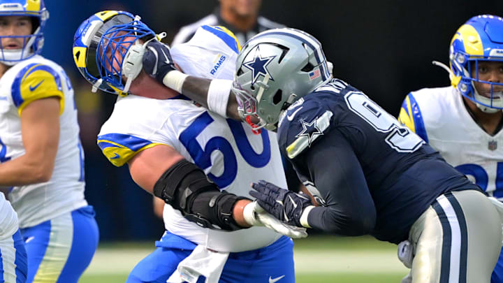 Los Angeles Rams center Beaux Limmer (50) and Dallas Cowboys defensive tackle Perrion Winfrey (99) battle on the line during the first half at SoFi Stadium. Los Angeles Rams center Beaux Limmer (50) and Dallas Cowboys defensive tackle Perrion Winfrey (99) battle on the line during the first half at SoFi Stadium.