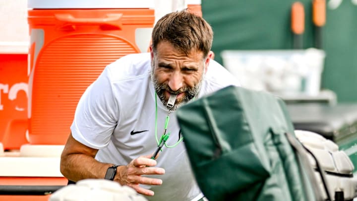 Michigan State's defensive coordinator Joe Rossi looks on while working with the linebackers during the first day of football camp on Tuesday, July 30, 2024, in East Lansing. Michigan State's defensive coordinator Joe Rossi looks on while working with the linebackers during the first day of football camp on Tuesday, July 30, 2024, in East Lansing.