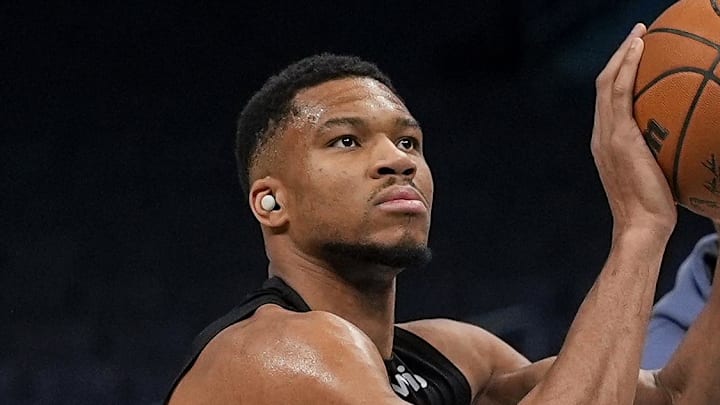 Feb 5, 2025; Charlotte, North Carolina, USA;  Milwaukee Bucks forward Giannis Antetokounmpo (34) shoots during pregame warm ups against the Charlotte Hornets at Spectrum Center. Mandatory Credit: Jim Dedmon-Imagn Images