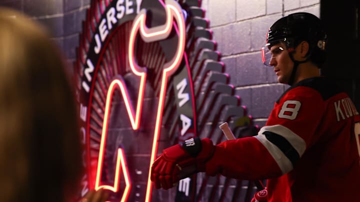 New Jersey Devils defenseman Johnathan Kovacevic (8) walks to the ice before the start of game three of the first round of the 2025 Stanley Cup Playoffs against the Carolina Hurricanes at Prudential Center. Mandatory Credit: Ed Mulholland-Imagn Images