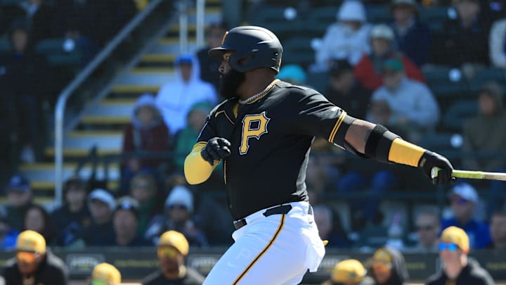Feb 23, 2026; Bradenton, Florida, USA; Pittsburgh Pirates designated hitter Marcell Ozuna (24) hits a RBI single during the first inning against the New York Yankees at LECOM Park. Mandatory Credit: Kim Klement Neitzel-Imagn Images Feb 23, 2026; Bradenton, Florida, USA; Pittsburgh Pirates designated hitter Marcell Ozuna (24) hits a RBI single during the first inning against the New York Yankees at LECOM Park. Mandatory Credit: Kim Klement Neitzel-Imagn Images