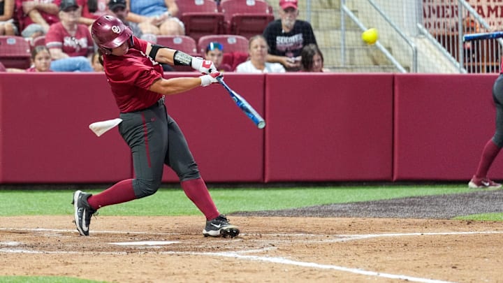 Freshman catcher Kendall Wells hits a home run during a fall exhibition game against Oklahoma Christian University at Love’s Field on Oct. 15 in Norman, Okla.
