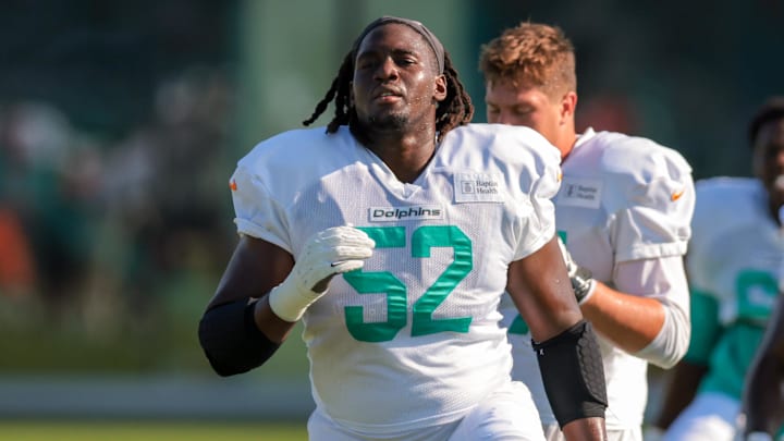 Jul 29, 2025; Miami Gardens, FL, USA; Miami Dolphins offensive tackle Patrick Paul (52) works on the field during training camp at Baptist Health Training Complex. Mandatory Credit: Sam Navarro-Imagn Images