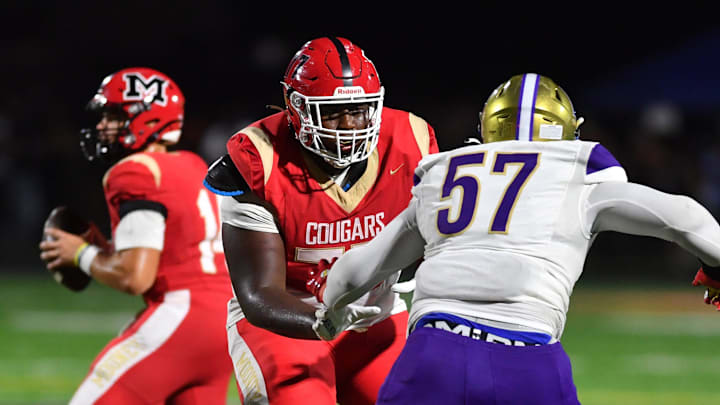 Cardinal Mooney offensive lineman Da'Ron Parks will choose between Auburn, Florida State, Ohio State, and Kentucky.