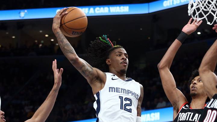 Apr 4, 2023; Memphis, Tennessee, USA; Memphis Grizzlies guard Ja Morant (12) drives to the basket during the second half against the Portland Trail Blazers at FedExForum. Mandatory Credit: Petre Thomas-USA TODAY Sports Apr 4, 2023; Memphis, Tennessee, USA; Memphis Grizzlies guard Ja Morant (12) drives to the basket during the second half against the Portland Trail Blazers at FedExForum. Mandatory Credit: Petre Thomas-USA TODAY Sports