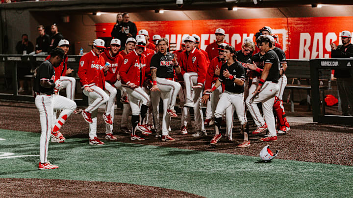 Sherman Johnson (far left) celebrates with his team after hitting a home run in NC State's 7-4 win over UNC-Wilmington on Tuesday, April 7, 2026. 