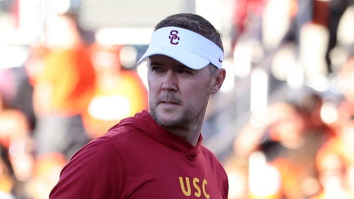 Sep 24, 2022; Corvallis, Oregon, USA; USC Trojans head coach Lincoln Riley watches his team warm-up before playing the Oregon State Beavers at Reser Stadium. Mandatory Credit: Jaime Valdez-Imagn Images Sep 24, 2022; Corvallis, Oregon, USA; USC Trojans head coach Lincoln Riley watches his team warm-up before playing the Oregon State Beavers at Reser Stadium. Mandatory Credit: Jaime Valdez-Imagn Images
