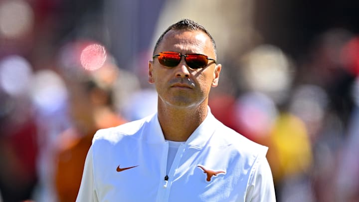 Texas Longhorns head coach Steve Sarkisian looks on before the game against the Oklahoma Sooners at Cotton Bowl. Texas Longhorns head coach Steve Sarkisian looks on before the game against the Oklahoma Sooners at Cotton Bowl.