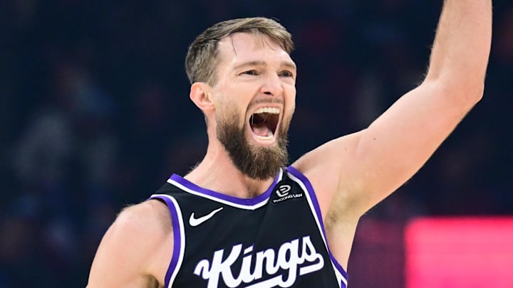 Jan 23, 2026; Cleveland, Ohio, USA; Sacramento Kings forward Domantas Sabonis (11) celebrates after hitting a three point basket against the Cleveland Cavaliers during the first half at Rocket Arena. Mandatory Credit: Ken Blaze-Imagn Images