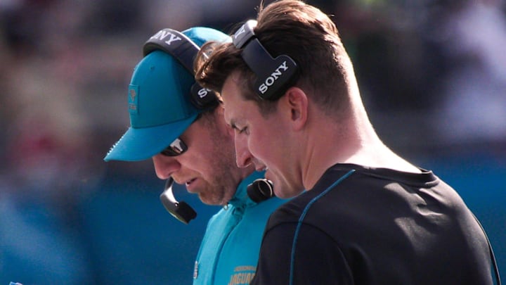 Jacksonville Jaguars head coach Liam Coen and Jacksonville Jaguars offensive coordinator Grant Udinski talk during the second quarter during an NFL football game at EverBank Stadium, Sunday, Dec. 14, 2025, in Jacksonville, Fla. Jacksonville Jaguars head coach Liam Coen and Jacksonville Jaguars offensive coordinator Grant Udinski talk during the second quarter during an NFL football game at EverBank Stadium, Sunday, Dec. 14, 2025, in Jacksonville, Fla.