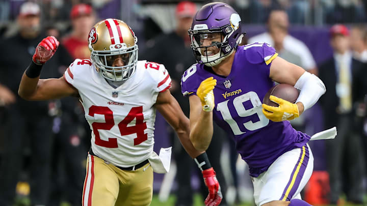 Minnesota Vikings wide receiver Adam Thielen (19) is tackled by San Francisco 49ers cornerback K'Waun Williams (24) during the first quarter at U.S. Bank Stadium.