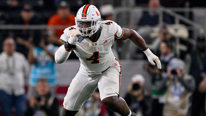 Dec 31, 2025; Arlington, TX, USA; Miami Hurricanes defensive lineman Rueben Bain Jr. (4) rushes the line during the 2025 Cotton Bowl and quarterfinal game of the College Football Playoff at AT&T Stadium. Mandatory Credit: Jerome Miron-Imagn Images
