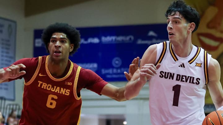 Nov 26, 2025; Lahaina, HI, USA;  Arizona State Sun Devils forward Santiago Trouet (1) goes for the net over USC Trojans forward Jacob Cofie (6) during the first half of the championship match at Lahaina Civic Center. Mandatory Credit: Marco Garcia-Imagn Images