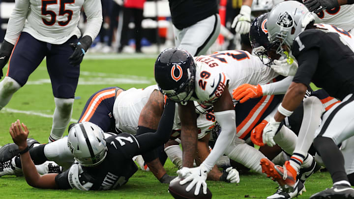 Tyrique Stevenson recovers a fumble in the Bears' 25-24 victory over the Las Vegas Raiders.