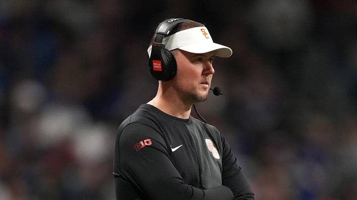 Dec 30, 2025; San Antonio, TX, USA; Southern California Trojans head coach Lincoln Riley watches from the sidelines against the TCU Horned Frogs in the first half during the Alamo Bowl at Alamodome.