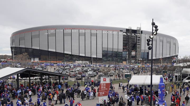 Fans enter Highmark Stadium before the start of the Bills home game against the Tampa Bay Buccaneers on Nov 16, 2025 in Orchard Park. In the background is the new stadium.