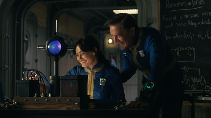(L-R) Ella Purnell (Lucy) and Kyle MacLachlan (Overseer Hank) in “Fallout”