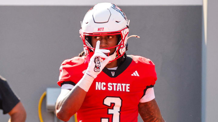 Oct 4, 2025; Raleigh, North Carolina, USA; NC State Wolfpack running back Hollywood Smothers (3) celebrates a touchdown during the first half of the game against Campbell Fighting Camels at Carter-Finley Stadium. Mandatory Credit: Jaylynn Nash-Imagn Images Oct 4, 2025; Raleigh, North Carolina, USA; NC State Wolfpack running back Hollywood Smothers (3) celebrates a touchdown during the first half of the game against Campbell Fighting Camels at Carter-Finley Stadium. Mandatory Credit: Jaylynn Nash-Imagn Images