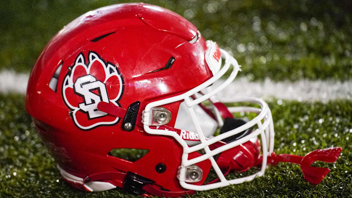 Aug 31, 2023; Columbia, Missouri, USA; A general view of a South Dakota Coyotes helmet against the Missouri Tigers during the second half at Faurot Field at Memorial Stadium.