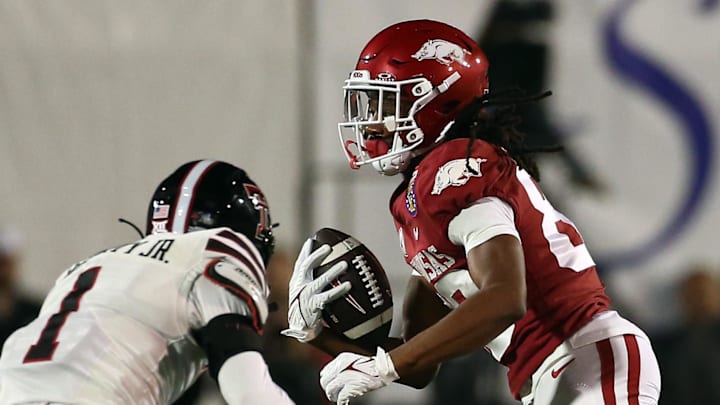 Arkansas Razorbacks wide receiver Dazmin James (83) runs after a catch during the second quarter against the Texas Tech Red Raiders at Simmons Bank Liberty Stadium.