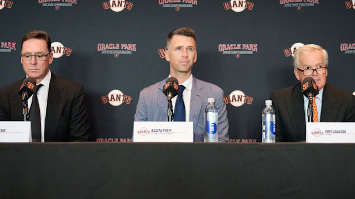 Oct 1, 2024; San Francisco, CA, USA; San Francisco Giants manager Bob Melvin (left), president of baseball operations Buster Posey (middle), and chairman Greg Johnson during a press conference at Oracle Park