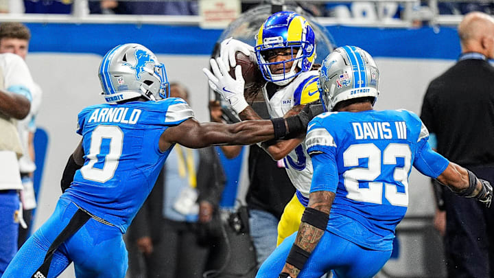 Detroit Lions cornerback Terrion Arnold (0) and cornerback Carlton Davis III (23) Detroit Lions cornerback Terrion Arnold (0) and cornerback Carlton Davis III (23)