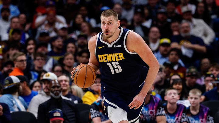 Apr 27, 2026; Denver, Colorado, USA; Denver Nuggets center Nikola Jokic (15) dribbles the ball up court in the third quarter against the Minnesota Timberwolves during game five of the first round of the 2026 NBA Playoffs at Ball Arena. Mandatory Credit: Isaiah J. Downing-Imagn Images