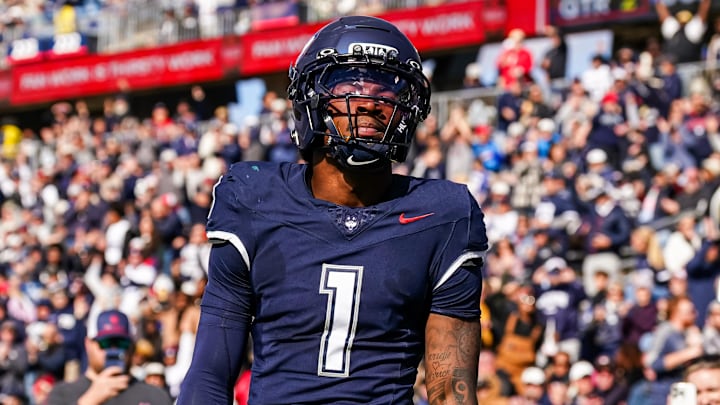 Nov 1, 2025; East Hartford, Connecticut, USA; UConn Huskies wide receiver Skyler Bell (1) reacts after his touchdown against the UAB Blazers in the second quarter at Pratt & Whitney Stadium at Rentschler Field. Mandatory Credit: David Butler II-Imagn Images