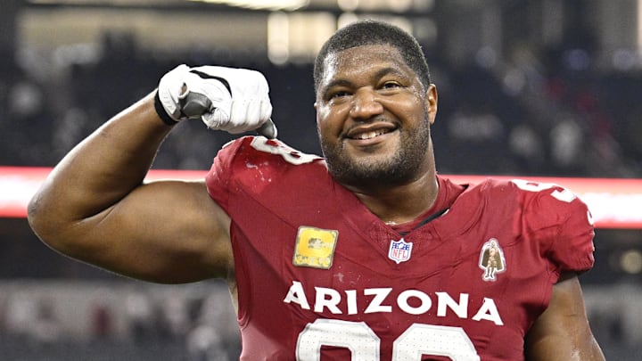 Nov 3, 2025; Arlington, Texas, USA; Arizona Cardinals defensive tackle Calais Campbell (93) celebrates as he leaves the field after defeating the Dallas Cowboys at AT&T Stadium. Mandatory Credit: Jerome Miron-Imagn Images