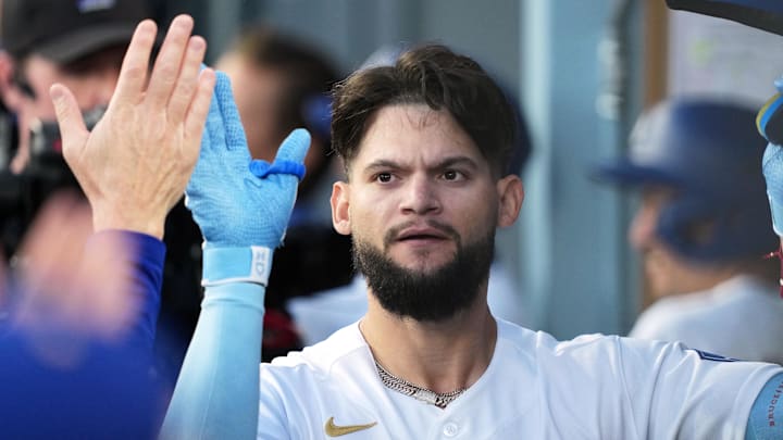 Mar 26, 2026; Los Angeles, California, USA; Los Angeles Dodgers outfielder Andy Pages (44) shakes hands with teammates in the dugout after hitting a three run home run against Arizona Diamondbacks starting pitcher Zac Gallen (not pictured) during the fifth inning at Dodger Stadium. Mandatory Credit: Kirby Lee-Imagn Images