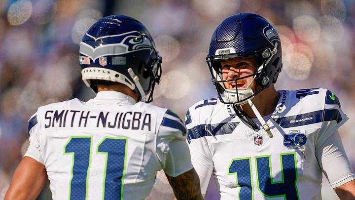 Seattle Seahawks wide receiver Jaxon Smith-Njigba celebrates his touchdown with quarterback Sam Darnold