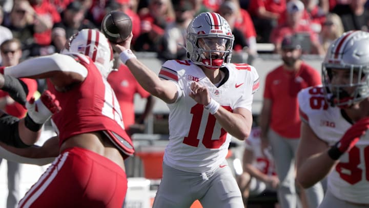 Oct 18, 2025; Madison, Wisconsin, USA; Ohio State quarterback Julian Sayin (10) throws a pass during the during the first quarter of their game against Wisconsin at Camp Randall Stadium. Oct 18, 2025; Madison, Wisconsin, USA; Ohio State quarterback Julian Sayin (10) throws a pass during the during the first quarter of their game against Wisconsin at Camp Randall Stadium.