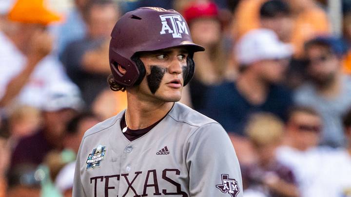 Jun 24, 2024; Omaha, NE, USA; Texas A&M Aggies right fielder Jace Laviolette (17) walks off as catcher Jackson Appel (20) walks up to bat during the sixth inning against the Tennessee Volunteers at Charles Schwab Field Omaha. Mandatory Credit: Dylan Widger-USA TODAY Sports Jun 24, 2024; Omaha, NE, USA; Texas A&M Aggies right fielder Jace Laviolette (17) walks off as catcher Jackson Appel (20) walks up to bat during the sixth inning against the Tennessee Volunteers at Charles Schwab Field Omaha. Mandatory Credit: Dylan Widger-USA TODAY Sports