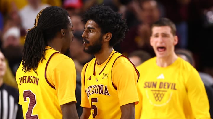 Mar 3, 2026; Tempe, Arizona, USA; Arizona State Sun Devils guard Maurice Odum (5) celebrates with Anthony Johnson (2) against the Kansas Jayhawks in the second half at Desert Financial Arena. Mandatory Credit: Mark J. Rebilas-Imagn Images