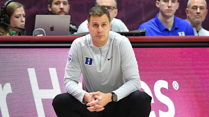Jan 31, 2026; Blacksburg, Virginia, USA; Duke Blue Devils head coach Jon Scheyer watches his team against the Virginia Tech Hokies during the second half against Virginia Tech Hokies at Cassell Coliseum. Mandatory Credit: Brian Bishop-Imagn Images